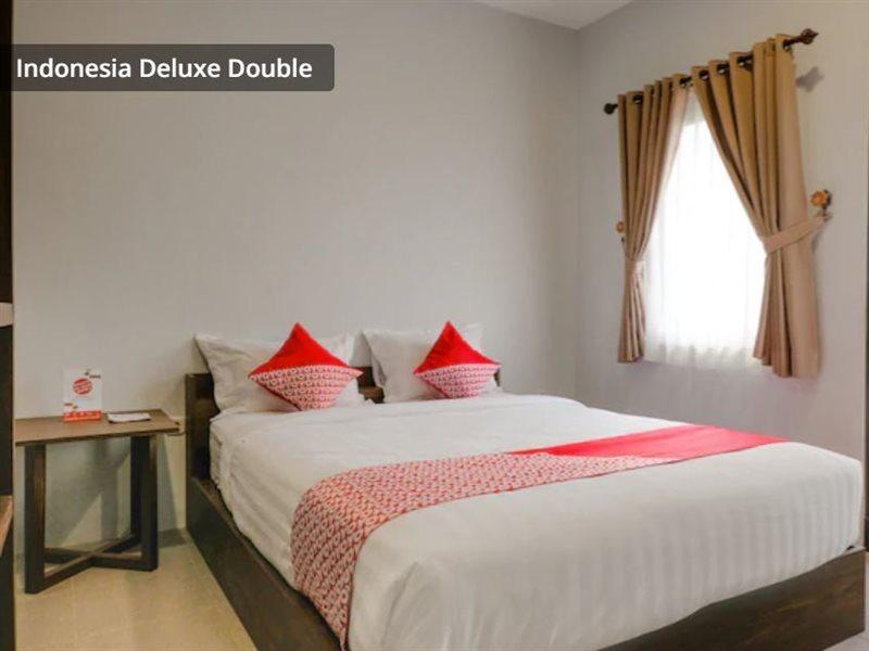 Panorama Inn Residence Batu Mitra Reddoorz Exterior photo